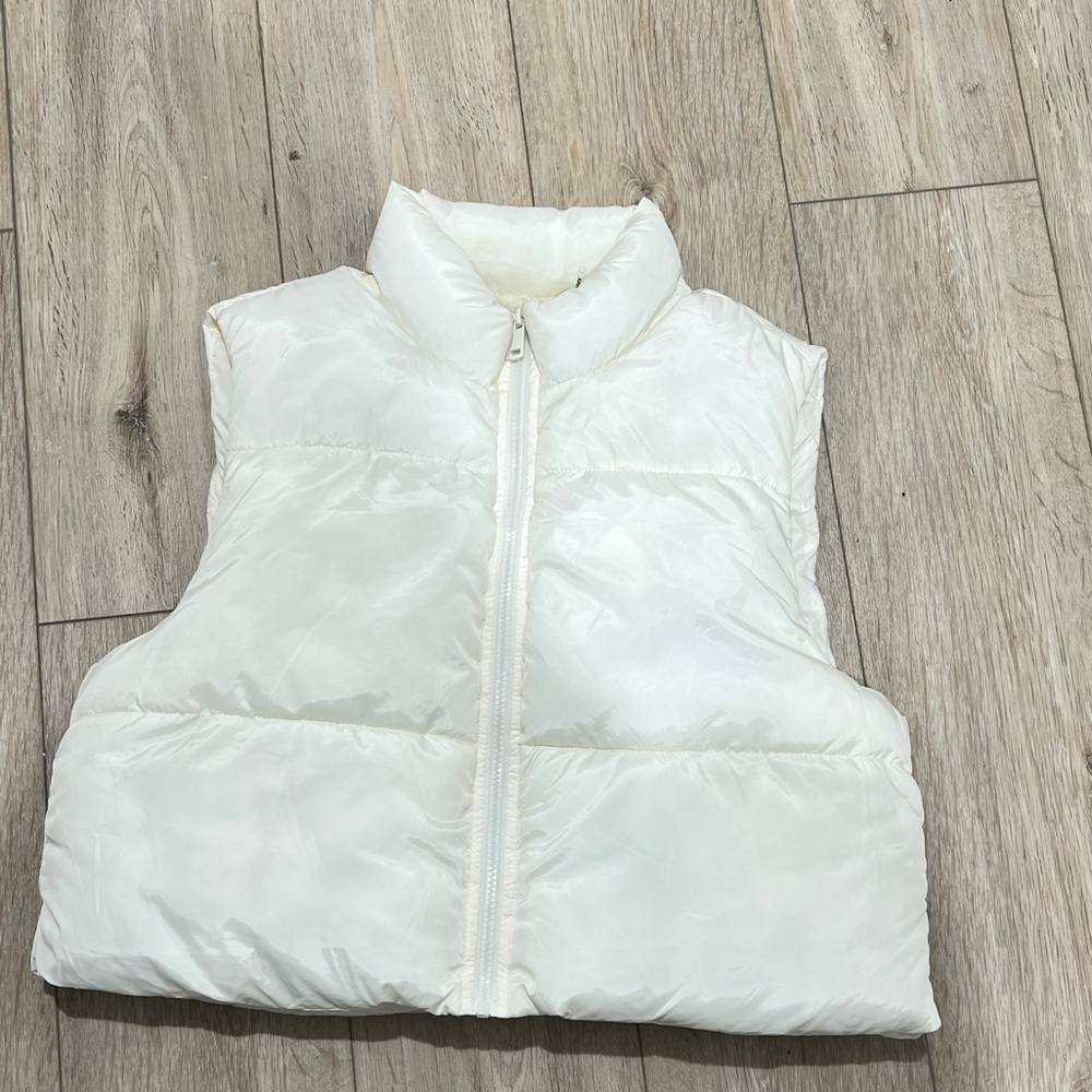 White puffer vest with zip up front